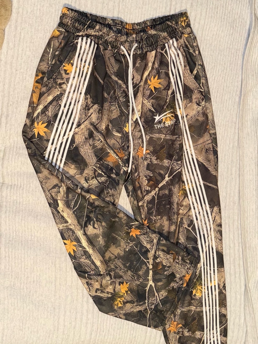 Spirit Camouflage Joggers with Orange Leaf Accents
